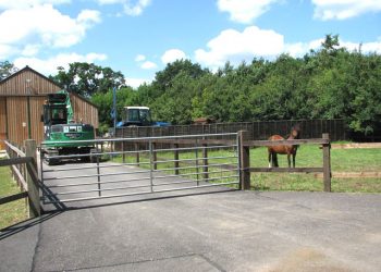 gated_entrance_to_farm_buildings_and_stables_-_geographorguk_-_1385712